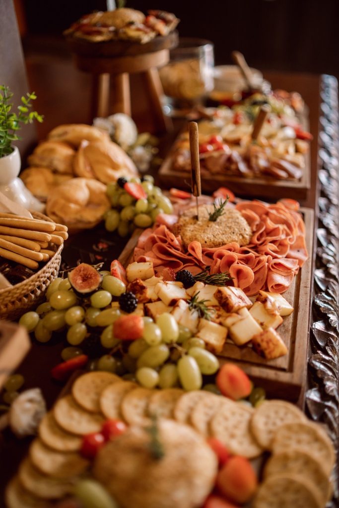 Wedding grazing table with an assortment of food and snacks