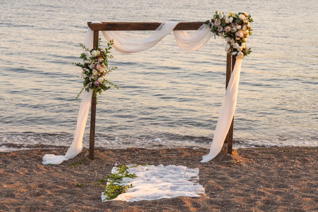 Eco-Friendly Wedding Arches and Backdrops set on a beach