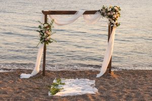 Eco-Friendly Wedding Arches and Backdrops set on a beach