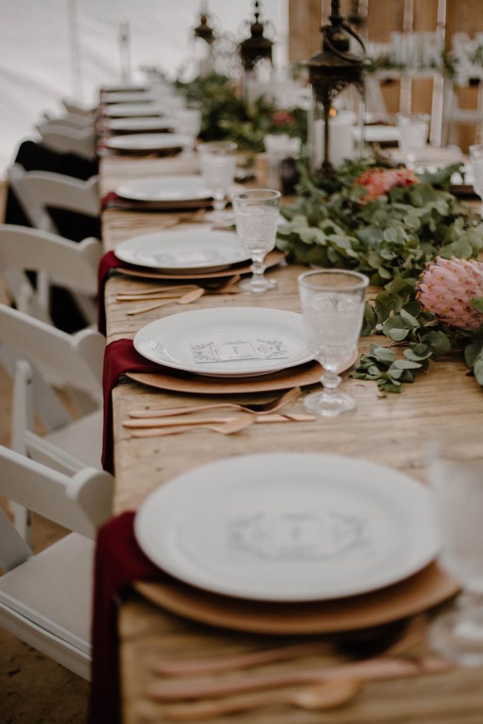 Wedding table set up with plates and dinnerware