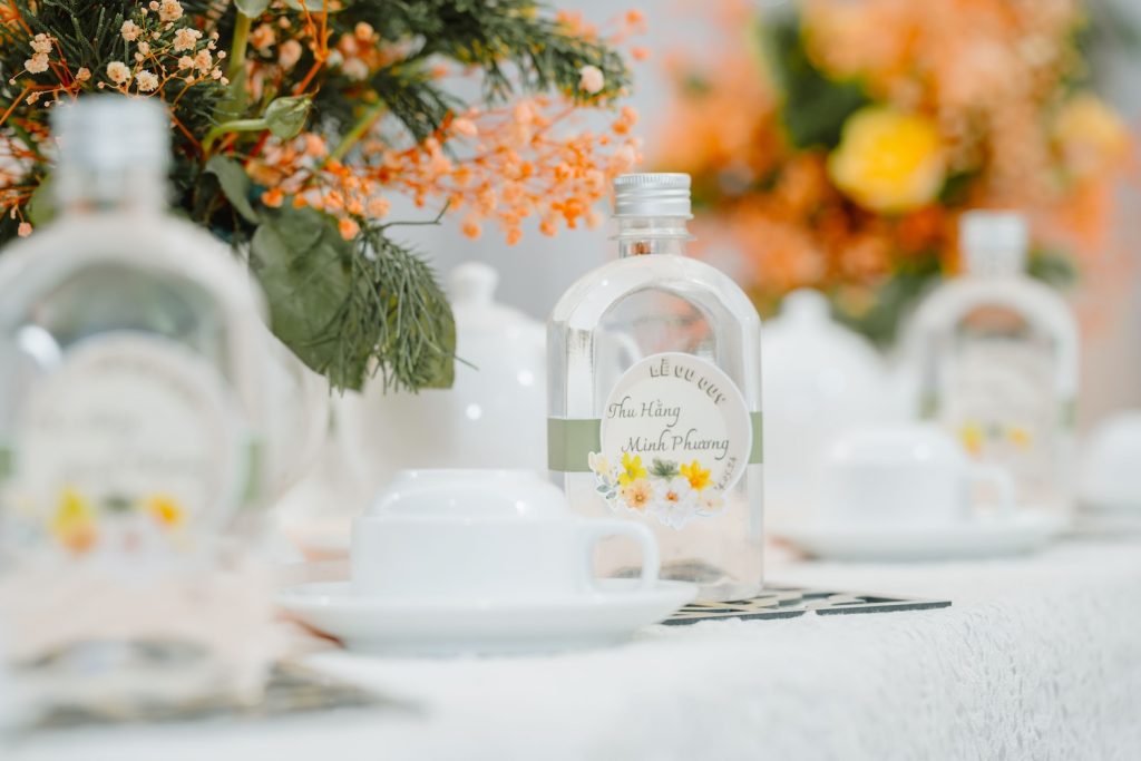 Eco-Friendly Wedding Water Bottle Options sitting on a wedding table