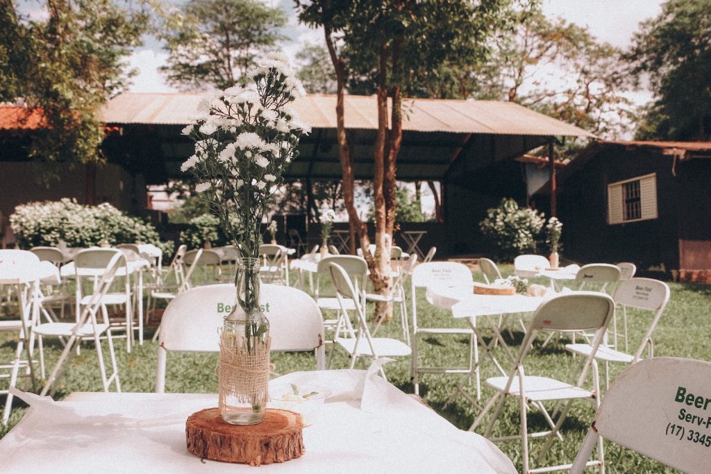 Wedding table and chairs laid out in a garden for a DIY wedding